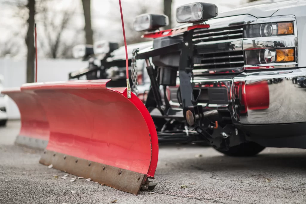 two Flagstaff Commercial Snow Removal plows