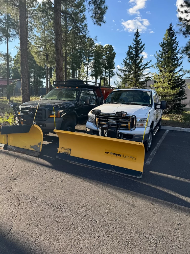 Two Snow plow Trucks in flagstaff Arizona