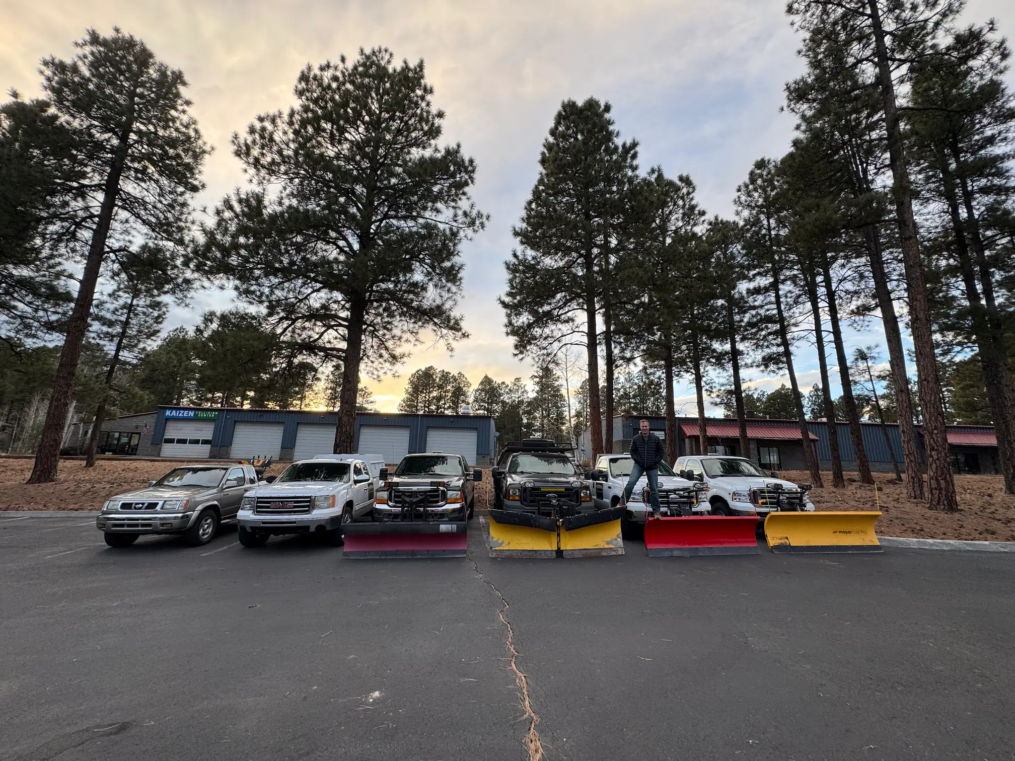 a fleet of snow removal trucks in flagstaff arizona