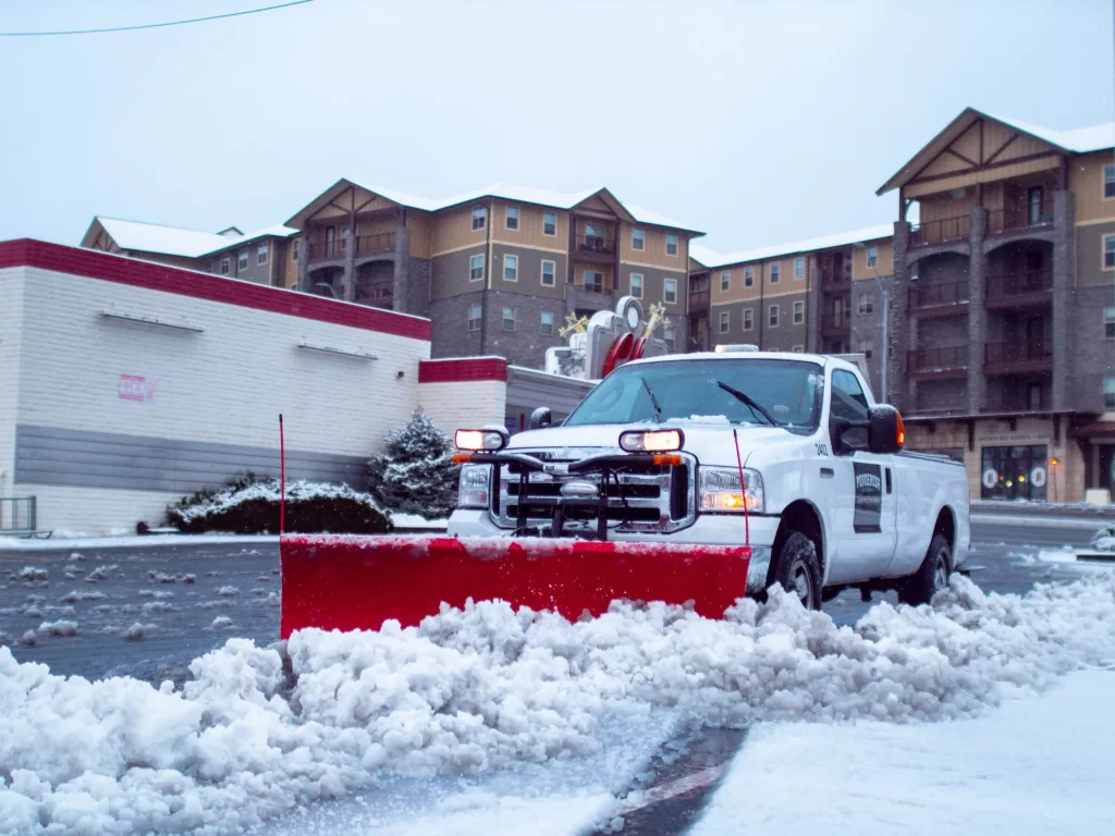 Ponderosa Pathways Flagstaff Snow Removal with a plow truck in local flagstaff