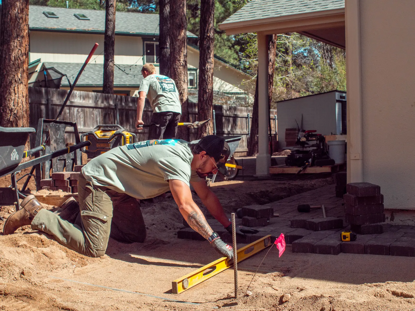 Ponderosa Pathways Flagstaff landscaping project — completed residential yard with rock install and native planting
